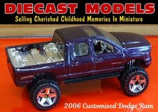 LIFTED 2006 DODGE RAM 1500 DOUBLE-CAB;  HOT WHEELS DIECAST MODEL PICK-UP TRUCK