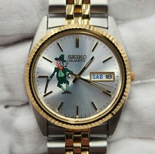 Seiko Mens Vintage Two Tone Day-Date w/ Leprechaun Accent Quartz Watch 7N43-3111