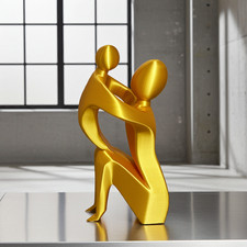 Mother and child sculpture - and,