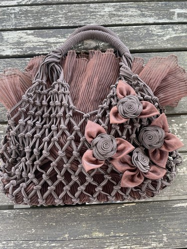 Unusual brown hand bag really - unusual,