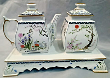 Franklin Mint Birds and Flowers of the Orient creamer and sugar pot on plinth