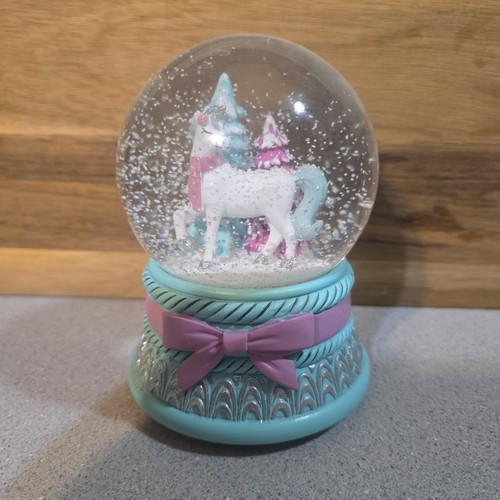 Unicorn snow globe - snow, music