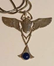 Egyptian Revival style winged