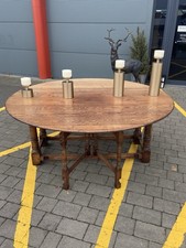 IMPOSING SOLID OAK DOUBLE GATELEG DINING TABE. OPENS TO FORM A 6ft. ROUND TABLE.
