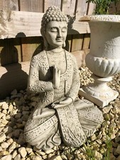 Reconstituted stone meditating - reconstituted,