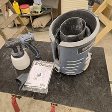 Electric paint spray gun with soft-grip handle and adjustable nozzle. Used