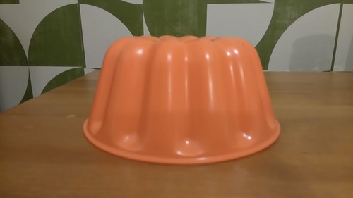 Orange plastic jelly mould - jelly,