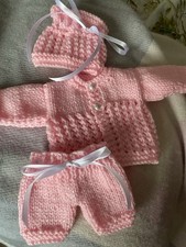 Hand Knitted dolls clothes to