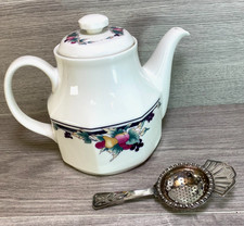 Royal Doulton  Autumn's Glory  Teapot  1991 and silver plated tea strainer
