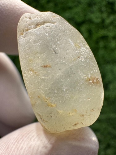 Naturally tumbled topaz not - naturally,
