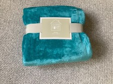 New  green Throw  by Cozee