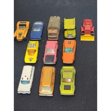 11 old Matchbox toy cars, etc.