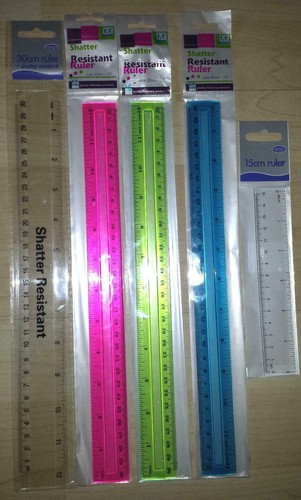 Clear colour plastic ruler - &,