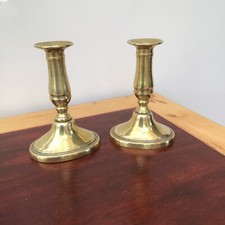 PAIR OF ANTIQUE/VINTAGE BRASS CANDLESTICKS 6”. Oval Base