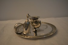 Vintage decorative silver-plated wee willy winkie candle holder.