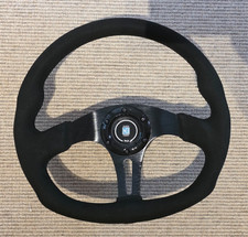 D shape steering wheel, Leather/Suede rim. Nardi horn push