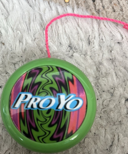 Proyo green with - yo-yo,