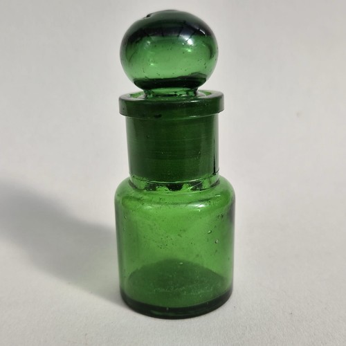 Antique green glass apothecary - green,