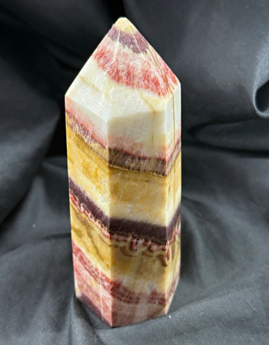 Banded calcite crystal - , tower