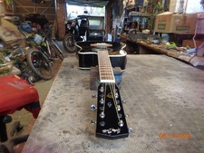Wide-neck acoustic 6 string