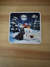 Empty Scottie Dogs tin