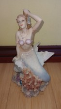 Veronese Mermaid Sitting on a