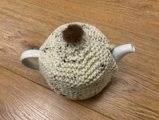 Hand knitted tea cosy, fits