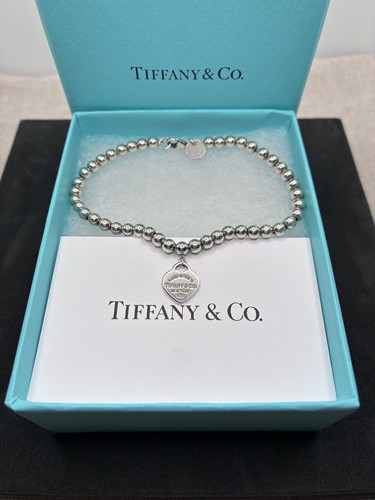 Authentic tiffany return - co.,