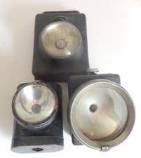THREE OLD BATTERY BIKE LAMPS
