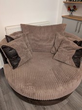 DFS Swivel Cuddle Arm Chair