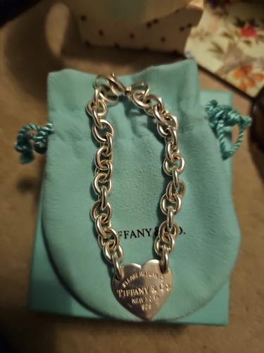 Please return tiffany co - tiffany,