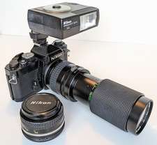 Nikon FE SLR Camera Kit. FE Body. 50mm lens. 70-210 Zoom lens. Speedlight flash