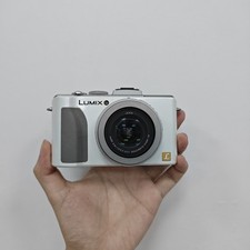 Panasonic Lumix DMC-LX5 10.1MP  3.8x Zoom Digital Camera English language White