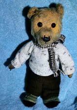 Hand knitted teddy bear
