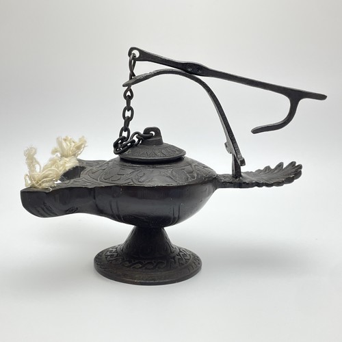 Vintage cast metal genie - metal,
