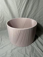 Blush pink silky fabric folded