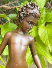 Bronze Girl Holding Rose