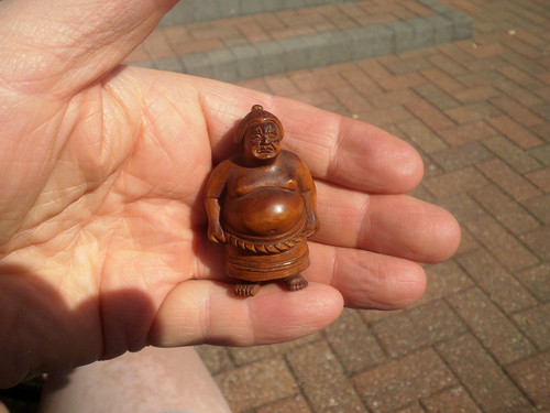 Hand carved netsuke - hand, sumo