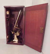 An  antique Baker brass microscope