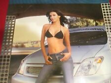Vintage Audiobahn Stereo Speakers Poster from 2004 with Model Leaning on Car