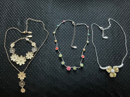 Necklace and bracelet made - and,