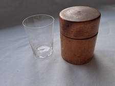 Vintage medicine apothecary dosing measure glass in wooden container