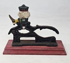 Cast Iron NUTCRACKER Soldier Nut Cracker Mounted on a Red Wood Base