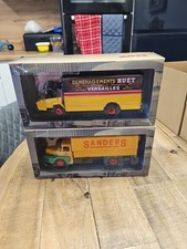 2 PLASTIC 1'43 Model Trucks