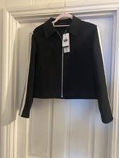Black Jacket with White Stripe