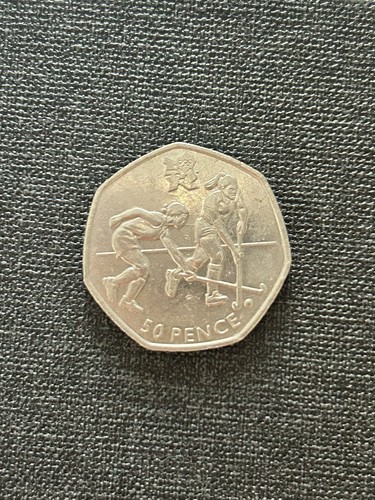 Olympic hockey 50p 2011 coin - hockey,