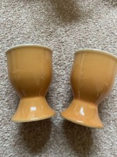 Yellow set of six 6 egg cups