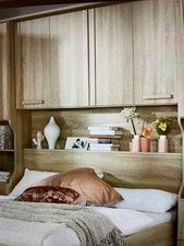 Oak effect overbed storage unit with wardrobes and drawers