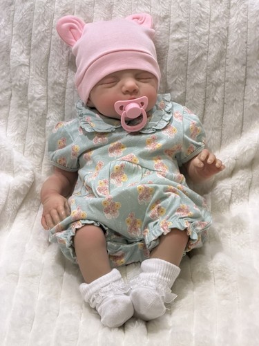Reborn weighted baby - doll, with