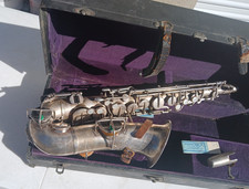 VINTAGE ELKHART SAXOPHONE.